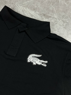 GOLA POLO LCST BIG CROC ALL BLACK na internet