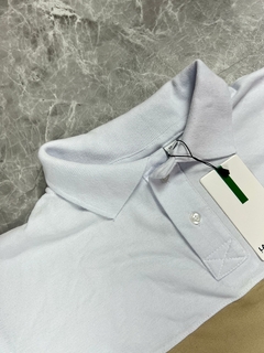 GOLA POLO LCST RECORTE BEGE E BRANCO na internet