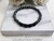 Pulsera Bolas De Hematites Y Piedra Volcánica Elastizada