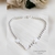 Pulsera Bolitas con 3 Cruces de Nácar en Acero Blanco