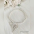 Pulsera De Bolitas y Tubo Con Ala De Ángel Elástica En Plata 925