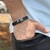 PULSEIRA DE COURO PRETO NÃO AJUSTÁVEL 1 TIRA LISA (DETALHE CROMADO)