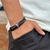PULSEIRA DE COURO PRETA 2 TRANÇADA PLUG MAGNÉTICO NÃO AJUSTÁVELV (CAVEIRA) CROMO