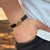 PULSEIRA DE COURO PRETO NÃO AJUSTÁVEL1 TIRA LISA (DETALHE DOURADO)