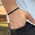 PULSEIRA DE COURO PRETO AJUSTÁVEL FECHO (PREGO CROMADO) 1 TRANÇADO