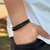 PULSEIRA DE COURO PRETO NÃO AJUSTÁVEL 2 TRANÇADO (COM DETALHE CROMADO)