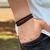 PULSEIRA DE COURO PRETO E VERMELHO NÃO AJUSTÁVEL 2 TRANÇADOS 1 TRANÇADO