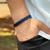 PULSEIRA DE COURO PRETO E AZUL NÃO AJUSTÁVEL 1 TRANÇADO