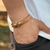 PULSEIRA DE COURO MARROM NÃO AJUSTÁVEL 1 TIRA LISA (DETALHE DOURADO)