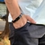 PULSEIRA DE COURO PRETO AJUSTÁVEL (CRUZ VAZADA PRETO)
