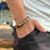 PULSEIRA DE COURO MARROM ESCURO AJUSTÁVEL (GRATIDÃO DOURADO)