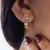 Brinco Ear Hook Retangular Banhado a Ouro 18k - Débora Martinez Semijoias | Compre e Esteja Pronta para Brilhar✨