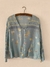 Camisa celeste con florcitas