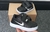NIKE BABY NEGRA CON ABROJOS