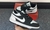 NIKE AIR JORDAN 1 LOW NEGRO/BLANCO - KIDS