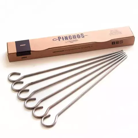 Conjunto de pinchos de acero inoxidable de La Planchetta, presentado en su caja de cartón