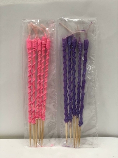 Velas palito con brillos