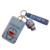 Porta sube con llavero Doraemon