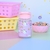 BOTELLA MINI CON PICO INFANTIL - Reino mayorista