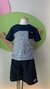 Camiseta com Recorte em Malha Listrada e Bolso