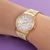 Relógio analógico social multifunções dourado - comprar online
