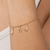 Pulseira com botas e ferradura banhada a ouro 18k - comprar online