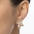 Brinco flor banhado a ouro 18k com zircônias na internet