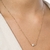 Gargantilha com pingente letra banhada a ouro 18k com zircônia - comprar online
