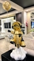 ASTRONAUTA COHETE DORADO