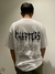 Remera blanca over side