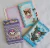 Anotador anillado sanrio con divisiones