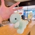 Llavero peluche dinosaurio - tienda online