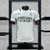 Camisa do Milan Puma Away 24/25, modelo branco com detalhes em vermelho e preto, exibindo logo da Emirates e da Puma, na versão jogador.