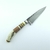 Cuchillo P1 Campero de 11 cm con hoja de acero negro y mango anillado.