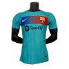Camisa Barcelona III 23/24 - Jogador Nike Masculina - Verde com detalhes em azul e vermelho