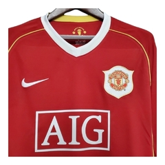 Camisa Retrô Manchester United I 2006/2007 manga longa - Nike Masculina - Vermelha com detalhes em amarelo e branco na internet