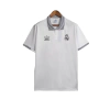 Camisa Real Madrid Polo 23/24 - Torcedor Adidas Masculina - Branca com detalhes em preto