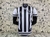 Camisa do Atlético Mineiro 2024/2025, com listras verticais em preto e branco, destacando o escudo do time e detalhes em dourado.