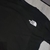 Remera The North Face “Total Black” en internet