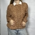 Sweater trenzas en internet