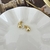 Aretes de gota dorada
