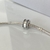Charm redondo con zirconias