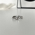 Anillo curveado plateado