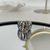 Anillo chuncky plateado líneas curvas