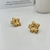 Aretes de flor pétalos textura
