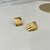 Aretes cuadrados con líneas