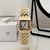 Reloj cuadrado oro laminado