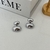 Aretes ovalados plateados doble uso
