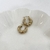 Hoops trenzadas con zirconias