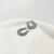 Aretes plateados con diseño